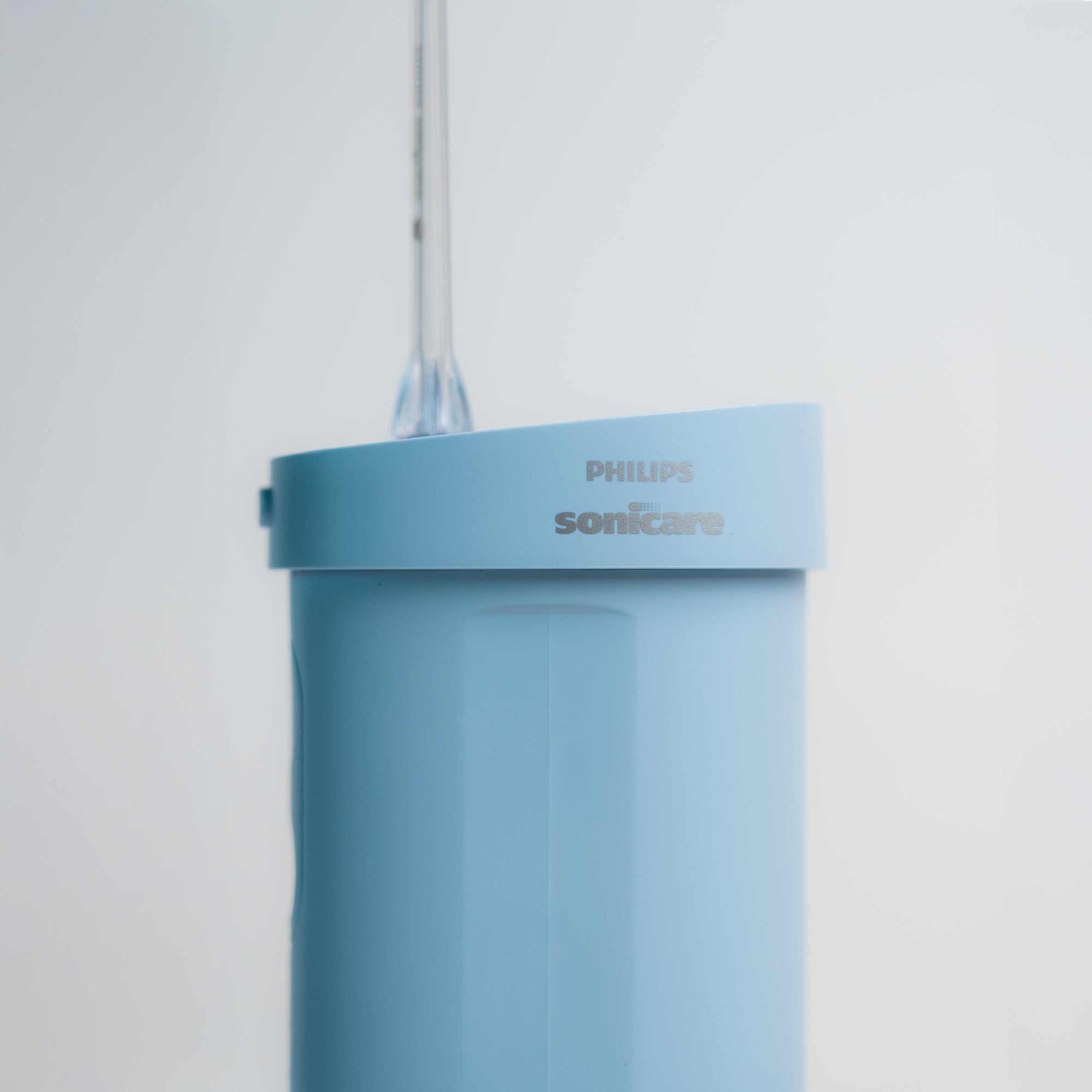 فيليبس سونيكير جهاز تنظيف مابين الأسنان صغير الحجم 1000 - أزرق 